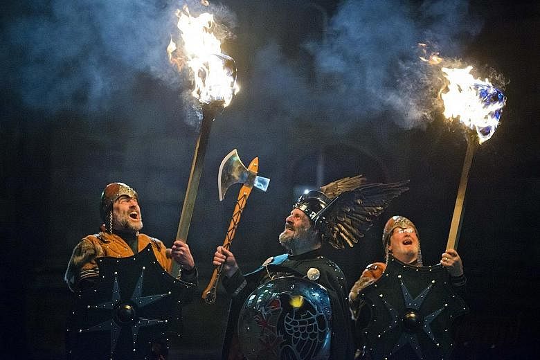 Pakistan's Kalasha people (above) celebrate the winter solstice in the festival Chaumos and a torch-lit procession (left) welcomes the new year at Edinburgh's Hogmanay.