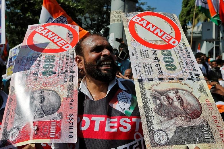 A rally in Mumbai organised by the Congress party against the government's decision to withdraw 500- and 1,000-rupee notes from circulation.