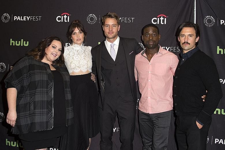 (From far left) Actors Chrissy Metz, Mandy Moore, Justin Hartley, Sterling K. Brown and Milo Ventimiglia at the screening of This Is Us in California in September. The feel-good family drama is NBC's breakout star of the season.
