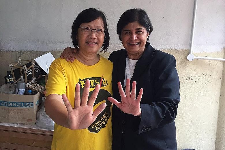 Ms Chin back home with Ms Ambiga after being released from police detention yesterday. She was held for being a key organiser of a street protest - Bersih 5 - against the government of Malaysian PM Najib Razak.