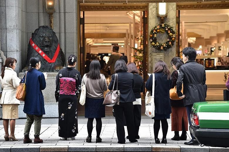 At a department store in Tokyo. Official data shows that the decrease in Japanese consumer spending is slower than expected, leading to hopes that the fall is bottoming out. Combined with improving job availability, this would be welcome news for the
