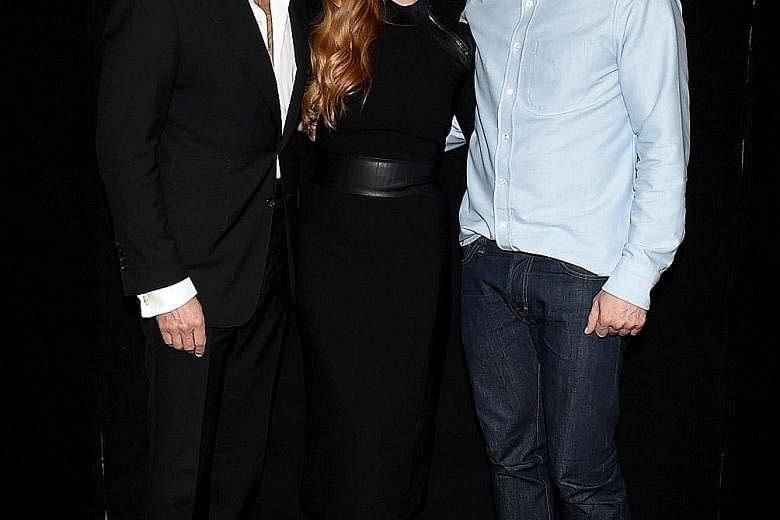 From left: Tom Ford, Amy Adams and Jake Gyllenhaal at the photo call for Nocturnal Animals in Los Angeles last month.