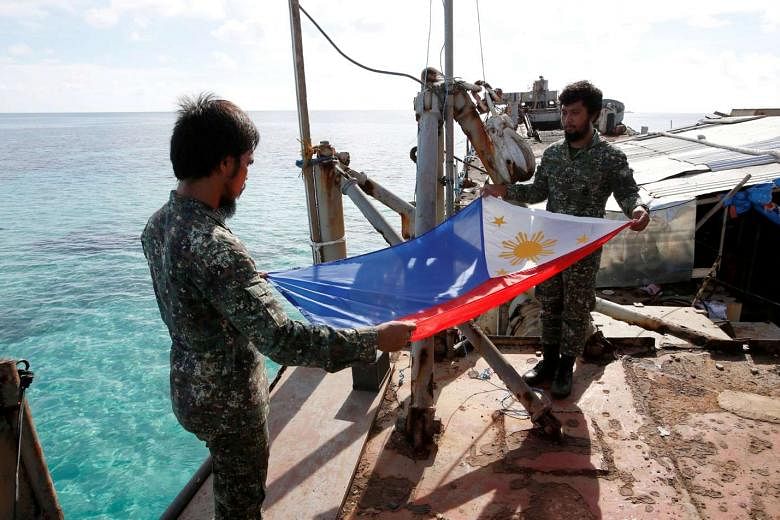 Philippine marines aboard a station in the disputed Spratly Islands in the South China Sea. Philippine President Rodrigo Duterte has declared the Philippines' "separation" from the US and said Beijing and Manila could "appropriately handle disputes". 