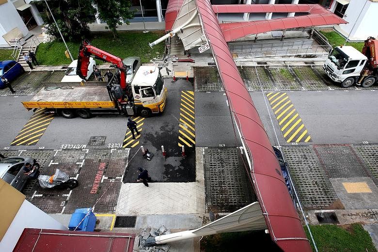 A lorry crane crashed into a walkway shelter in Bukit Batok in June this year. From next year, lorry cranes will have to be fitted with audio warning systems which will alert drivers if their cranes have not been stowed.