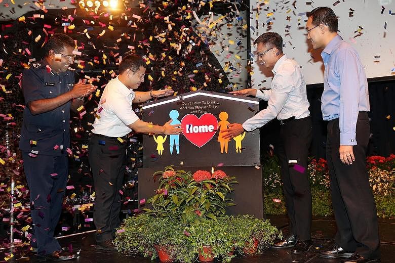 From left: Deputy commander of the Traffic Police and assistant commissioner of police Devrajan Bala, Senior Minister of State Desmond Lee, executive director of the Singapore Road Safety Council, Mr Chua Chee Wai, and executive vice-president of the
