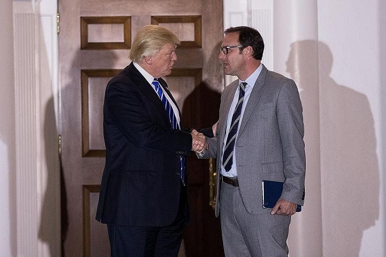 US President-elect Donald Trump with Mr Todd Ricketts, co-owner of the Chicago Cubs. Mr Trump nominated Mr Ricketts for US Deputy Commerce Secretary on Wednesday.