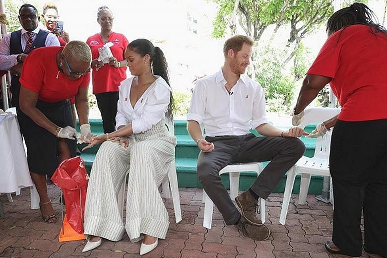 To raise awareness about Aids, Prince Harry and pop queen Rihanna took an HIV test in public in Barbados.