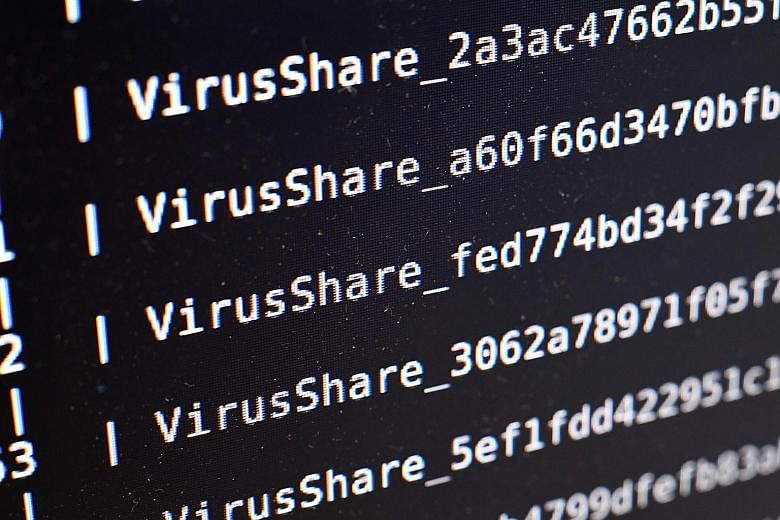 Viruses being listed on screen in a high-security laboratory for cyber-security research at the Inria Rennes centre in France. The latest raids came after four years of investigations by specialists in 41 nations.