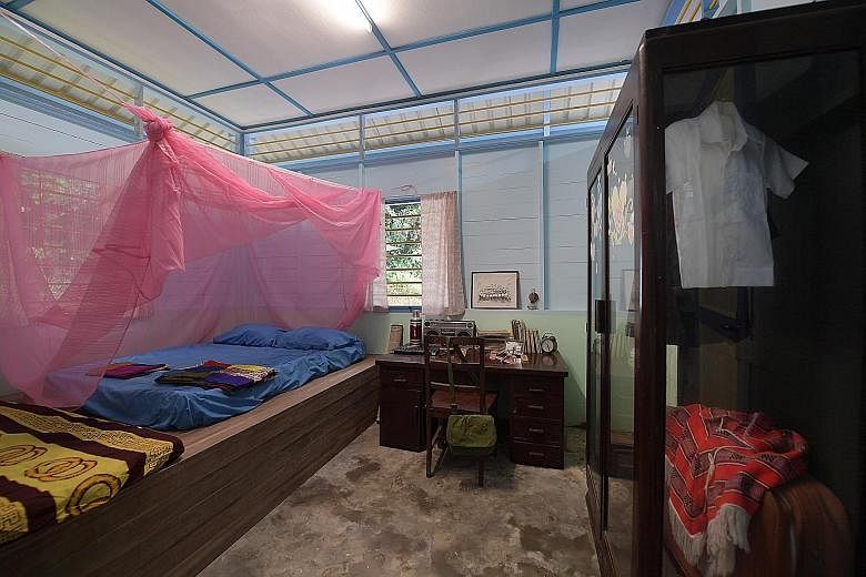 Above: A refurbished 1970s Chinese kampung house, complete with a mosquito net-covered bed, will take visitors back to days gone by. Left: The 1ha orchard, with trees planted by students, will feature around 350 fruit trees from 30 different species,