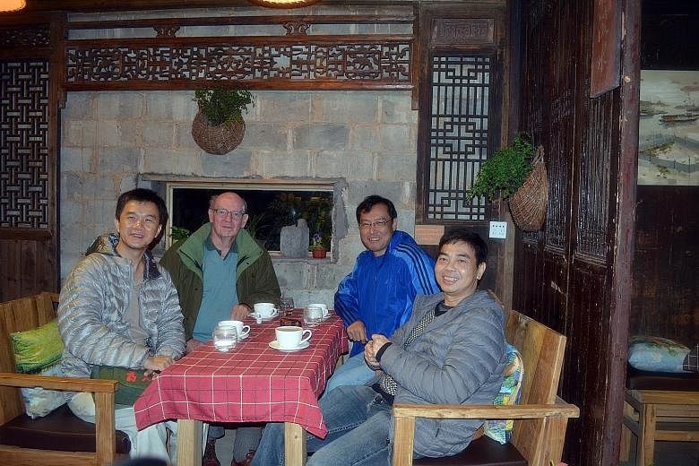 (From left) The writer with his friends Richard Hale, Frank Chiew and Lawrence Chang at the Yellow Mountains in central China in November last year. Enduring friendships like theirs take time to develop, he says. Similarly, investors ought to go for 