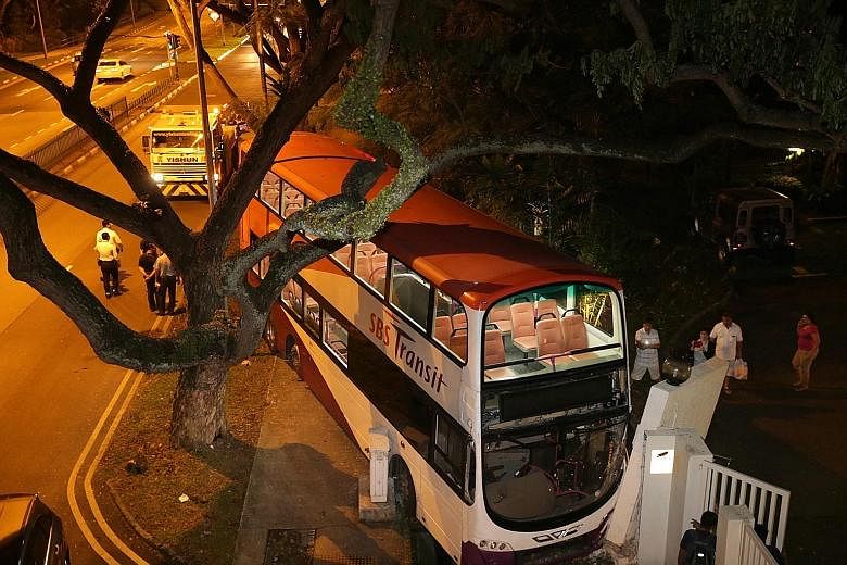 The bus ended up on the pavement outside Eastern Lagoon 2 condominium. It narrowly missed hitting a tree.