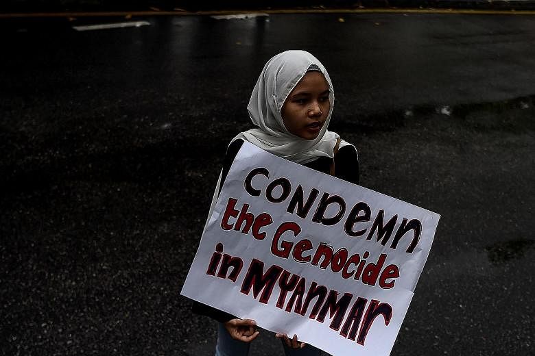 A Malaysian girl taking part in a protest against the persecution of Rohingya Muslims in Myanmar, outside the Myanmar Embassy in Kuala Lumpur last month.