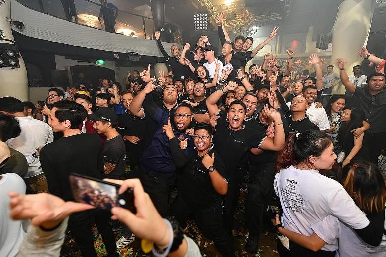 Zouk’s security team joining partygoers on the floor as the lights came on yesterday morning.