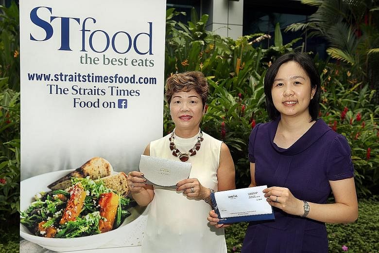 Madam Karen Lee (left) won a Fullerton Hotel staycation, which she plans to enjoy with her husband, while Ms Low Pei Han plans to give her M Social Singapore staycation prize to her parents.