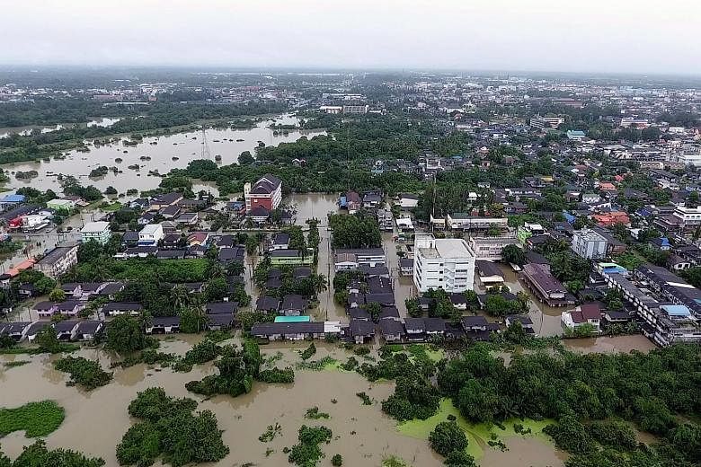 Flooding in Nakhon Si Thammarat province in southern Thailand on Sunday. The floods are reported to have submerged many parts of at least 18 districts, affecting 1,245 villages.