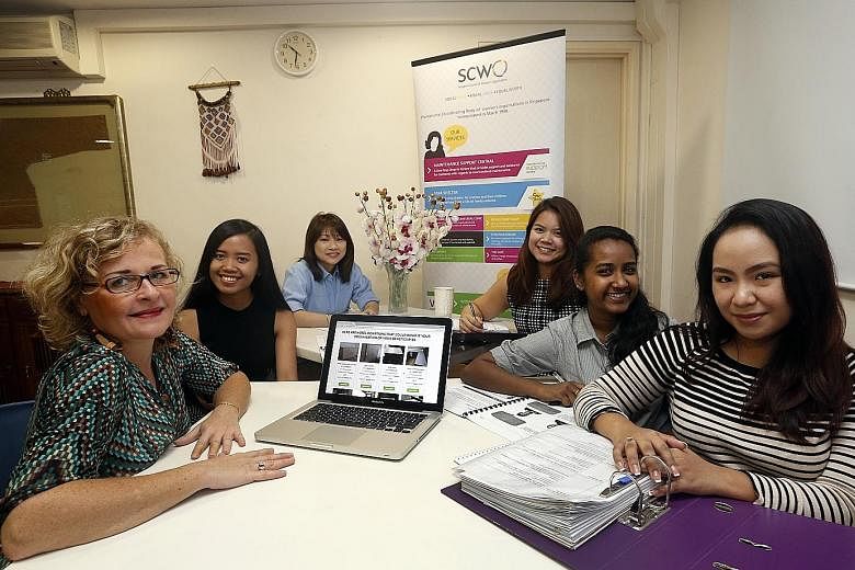 (From left) Papayapaths' Ms Boutin-Becuwe and SCWO staff Elena Karim, Amanda Ho, Denise Balhetcher, Rosabella Ann Renee Robert and Elaine Danielle Juan with the tables SCWO received from Ibis Singapore on Bencoolen.