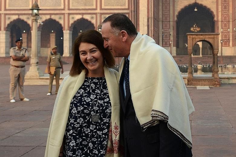New Zealand Premier John Key and his wife Bronagh during a visit to the historic Jama Masjid mosque in New Delhi on Oct 27. Entering politics late, Mr Key quickly showed that behind the affable exterior was an acute political operator.
