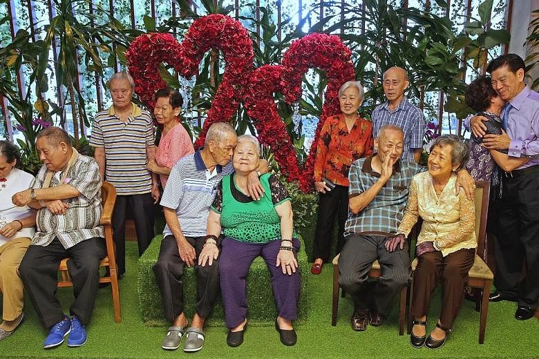 Six elderly couples renewed their vows at ROM yesterday after getting married more than 50 years ago. It was the first time ROM conducted a wedding vow renewal ceremony. (From left) Madam Tan Soon Gek and Mr Lim Peck Kan; Mr Wong Yee Fun and Madam Ch