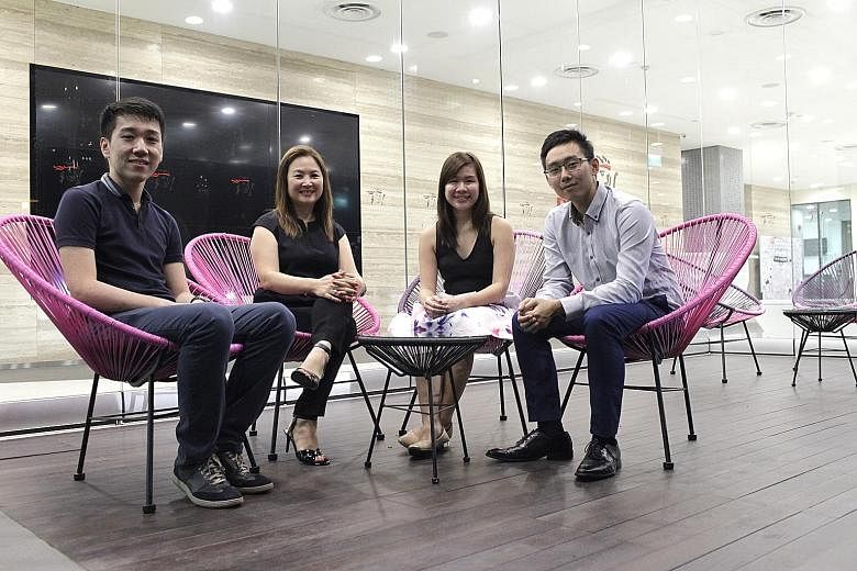 MentorsHub founder Candice Chee (second from left) with mentees (from left) Tan Chee Wee, 24, Tng Hui Min, 22, and Chau Pak Heen, 25. MentorsHub targets undergraduates aged between 21 and 25.