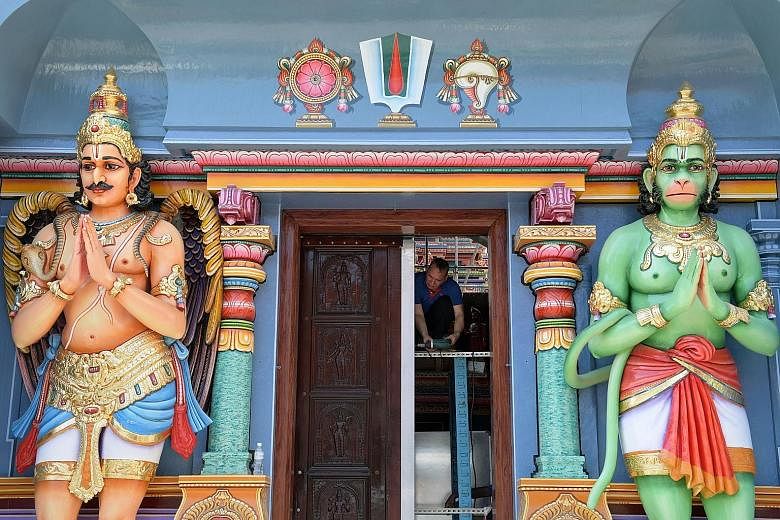 Hindu deities Garuda and Hanuman on the facade of the Sri Vadapathira Kaliamman temple. Tomorrow's consecration ceremony will be led by 44 priests from India and 25 priests from Singapore.