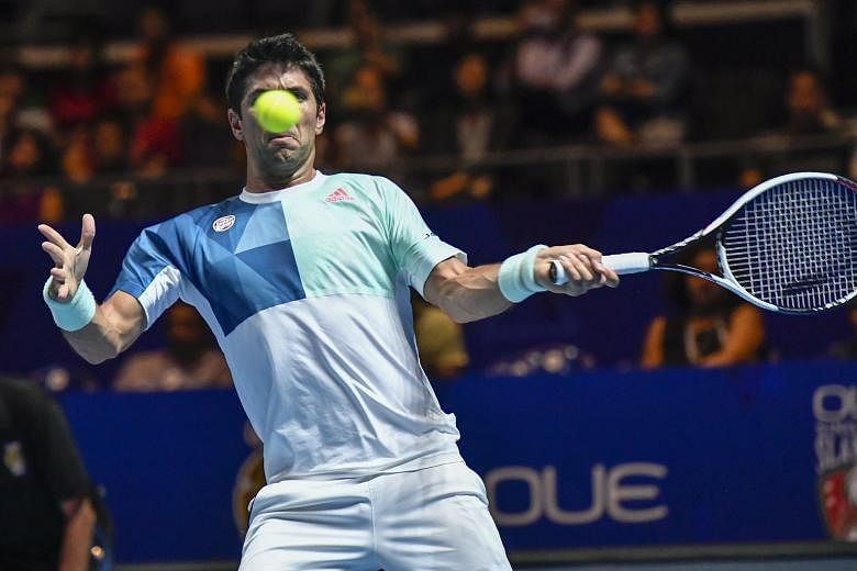 Japan Warriors' Fernando Verdasco hitting a forehand during his 6-1 win over fellow Spaniard Feliciano Lopez of the Indian Aces. The world No. 42 described Singapore as a country that "looks futuristic, like a mix of Avatar and Jurassic Park".