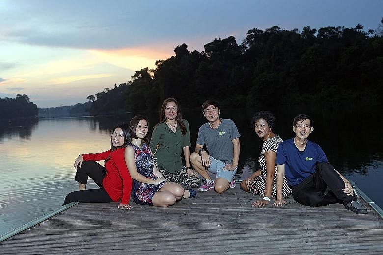 (From left) Volunteers Debra Teng; Jaclyn Yeo; Teresa Teo Guttensohn, 53, a protocol manager; Loh Choe Hwa, 34, an outdoor educator; Rani Singam and Tan Hang Chong at MacRitchie Reservoir Park. They are among those who have come together to spread aw
