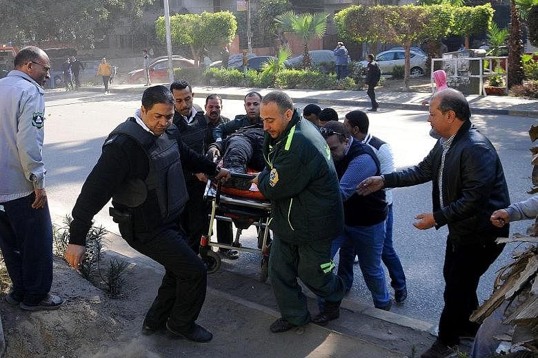 A victim being taken away from the bombing site. The attack happened shortly before Friday prayers.