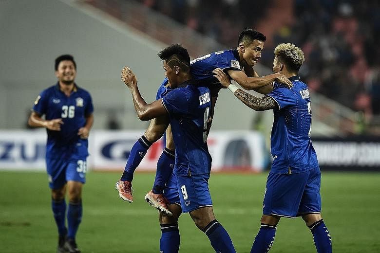 Thailand's Chanathip Songkrasin is chaired off after scoring against Myanmar during the AFF Suzuki Cup semi-final in Bangkok on Thursday. Reforming the domestic league has had a major flow-on effect.