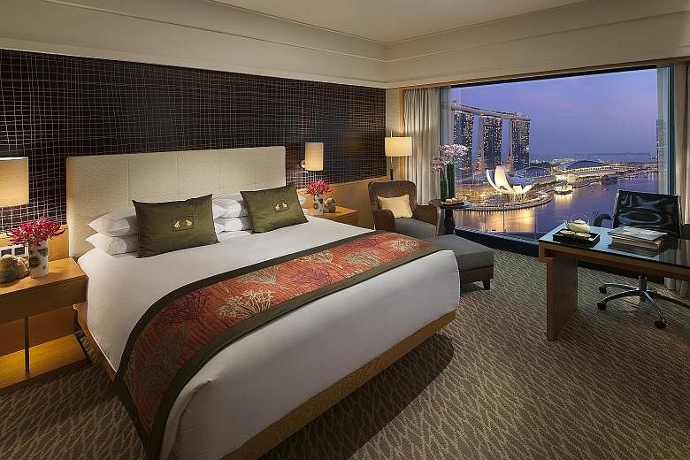 Up for grabs: Stays at Mandarin Oriental Singapore (above) and Grand Copthorne Waterfront; a catering package from Purple Sage; and a meal at Hua Ting Steamboat.
