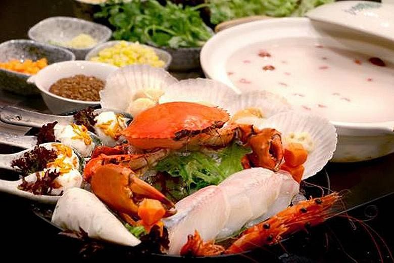 Up for grabs: Stays at Mandarin Oriental Singapore and Grand Copthorne Waterfront; a catering package from Purple Sage; and a meal at Hua Ting Steamboat (above).