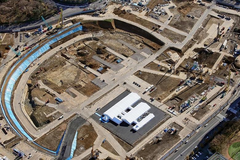 Preparations under way at the site of the Tokyo 2020 Olympics stadium, in a photo taken by Kyodo over the weekend. Due to be completed in 2019, the venue is now set to cost $1.85 billion instead of over $2.9 billion.