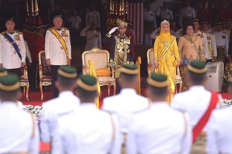 Sultan Abdul Halim and Queen Haminah at the send-off ceremony yesterday with (from left) Deputy Prime Minister Ahmad Zahid Hamidi, Prime Minister Najib Razak and his wife, Datin Seri Rosmah Mansor.