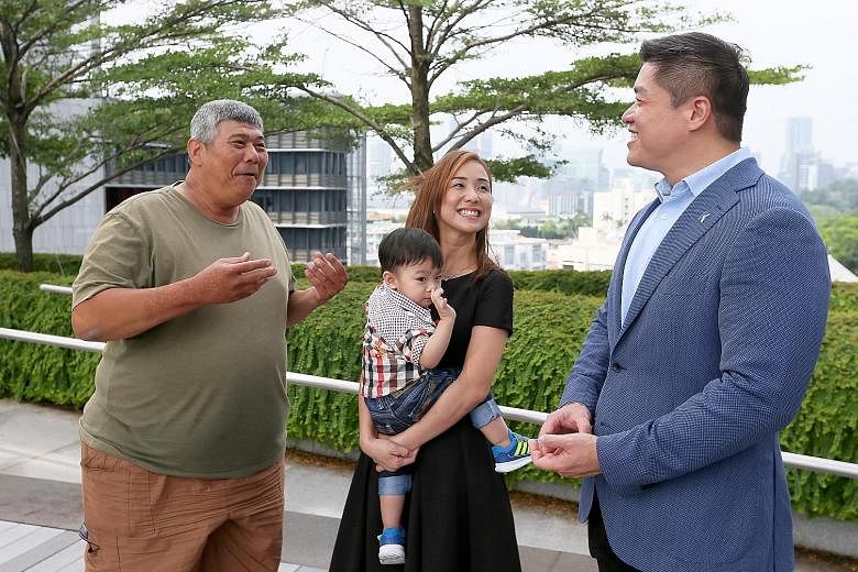 Mr Shu (left) and Ms Tay (with her son Jaydon Low) with Mr Choong, president of Kaplan Singapore, yesterday. Above: Ms Shu, the beneficiary of Kaplan's sponsorship, plans to pursue art and design in university.