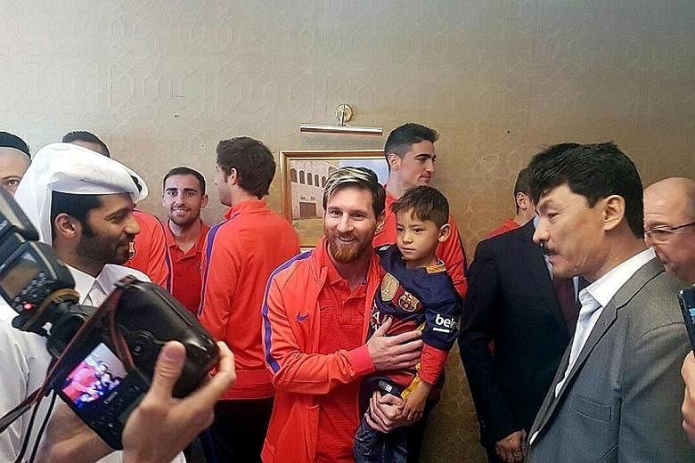 More than 10 months after Murtaza Ahmadi became an Internet sensation when pictures of him wearing an improvised Lionel Messi football shirt made from a plastic bag (above) went viral, the six-year-old Afghan boy finally got to meet his idol. Murtaza