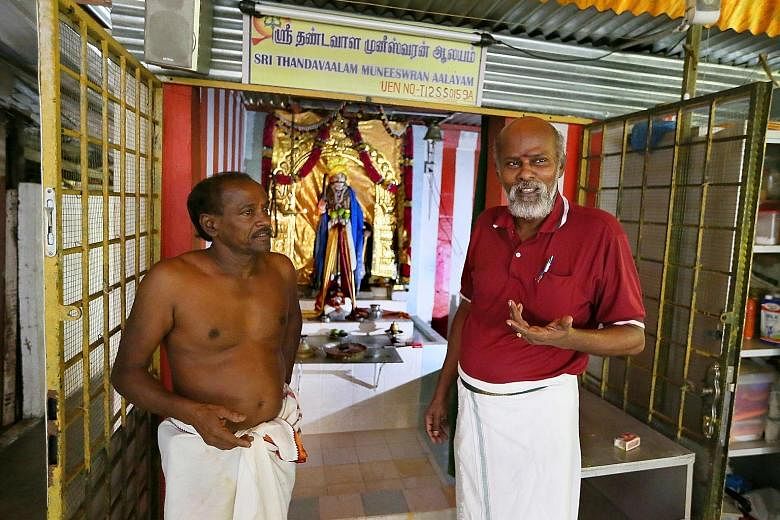 Shrine treasurer Adaikalam Annadhurai (right) and Mr Thirunaukarasu Adaikalam (far right), who heads the management committee, say if they had to move, they would prefer another site along the Rail Corridor.