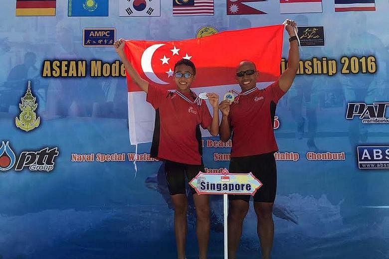 Ian Izree Hairul Nazwa, 13, won bronze and silver at the Asean Modern Pentathlon Championship in Thailand while his father, Hairul Nazwa Dol, 40, won a silver medal. The meet was their third modern pentathlon together.
