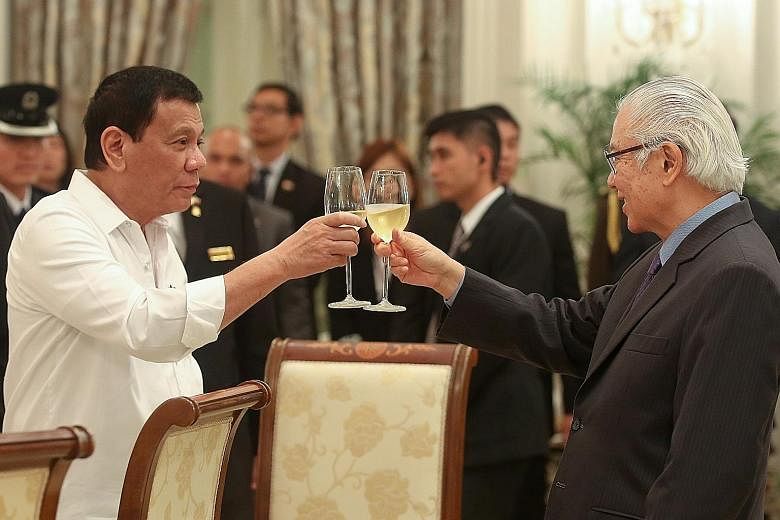 President Tan and President Duterte toasting last night at a banquet in honour of the visiting Philippine leader. Dr Tan said Singapore companies are keen to invest in the Philippines.