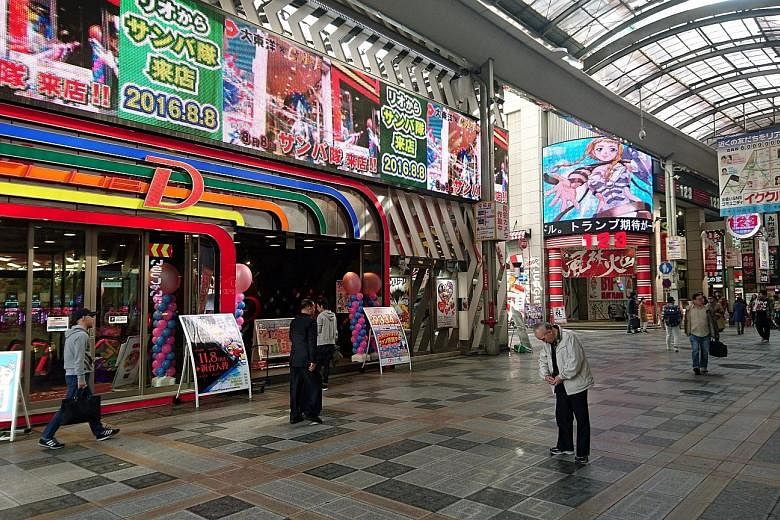 A pachinko parlour in Osaka. The pinball-like slot machine game operates in a legal grey area, as prizes won are redeemed for cash at another place. Japan's passage of the law allowing casinos in the country gives the gaming industry an inroad into t
