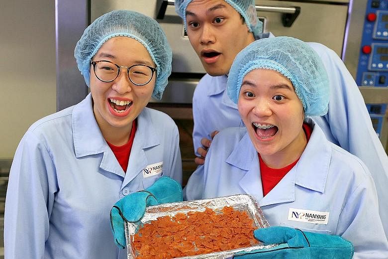 The four-member NYP team, which includes (from left) Ms Lai, Mr Muhammad Haziq and Ms Peh, incorporated okara, a soya bean residue, together with chicken to make their bak kwa and baked it to a crisp.