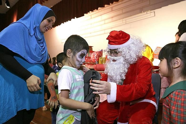 Muhamad Hussain Shah, six, received Christmas gifts for the first time on Sunday.
