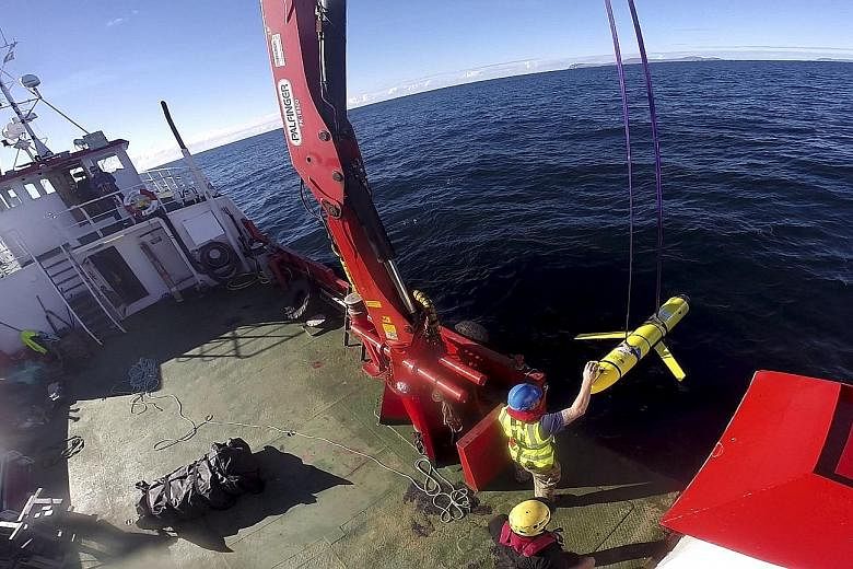 An underwater drone being recovered off Scotland in October. China's seizure of a similar US Navy drone likely reflects rising concern about the US tracking Chinese submarines, according to The Wall Street Journal.