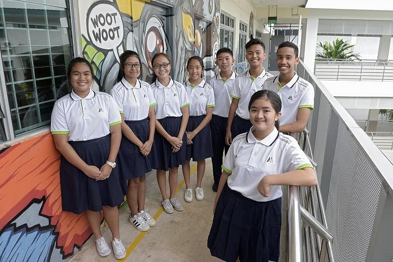 Former Coral Secondary students (clockwise, from far left) Irdina Zahid, 14, Nadya Yazid, 15, Sit Lixin, 14, and Casandra Lee, 15, with Siglap's Gregg Tey Yi Xiang, 14, Timothy Yeo, 14, Mohamad Wira, 15, and Andrea Atienza, 15.
