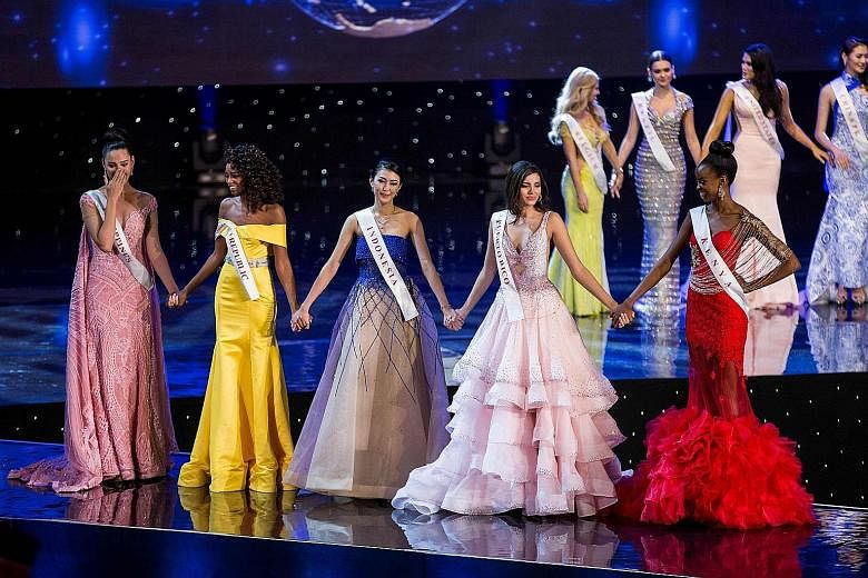 Puerto Rico's Miss Stephanie Del Valle (fourth from left), who has been crowned Miss World 2016, taking the stage during the grand final of this year's pageant in the United States on Sunday with finalists (from left) Miss Philippines Catriona Elisa 