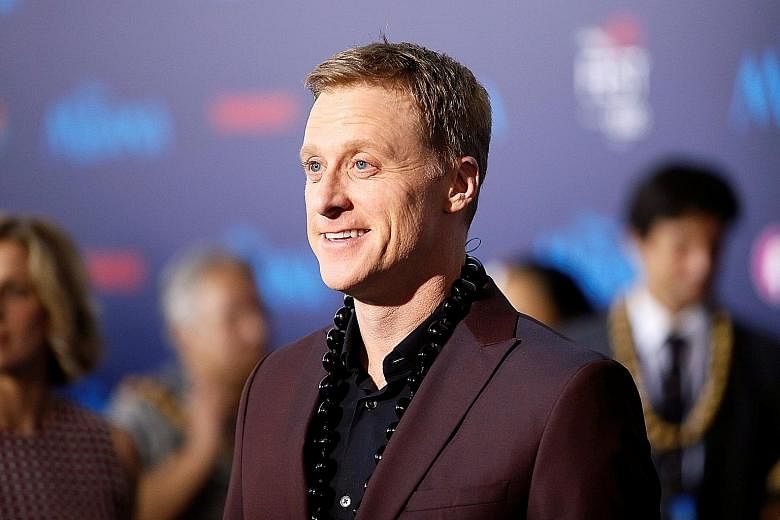 Actor Alan Tudyk (above) plays Rogue One's droid K-2SO, seen here with Rebel fighters Cassian Andor (Diego Luna) and Jyn Erso (Felicity Jones).