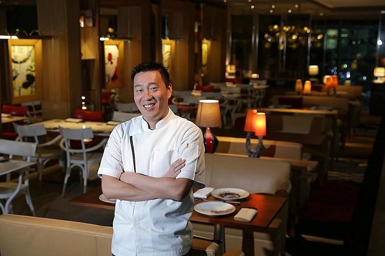 Chef Akira Back at his namesake restaurant in JW Marriott Hotel Singapore South Beach.