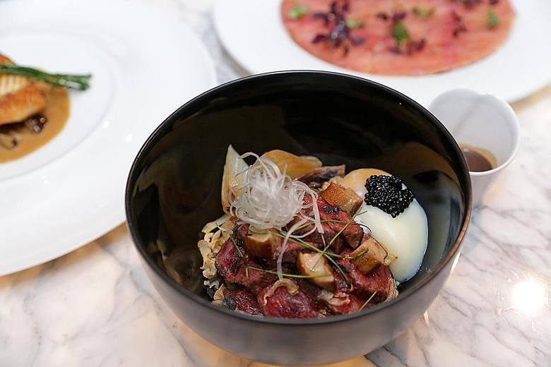 The Gyudon ($42), a beef bowl featuring brown rice from Hokkaido, grilled Ohmi wagyu beef slices, foie gras and an onsen egg.