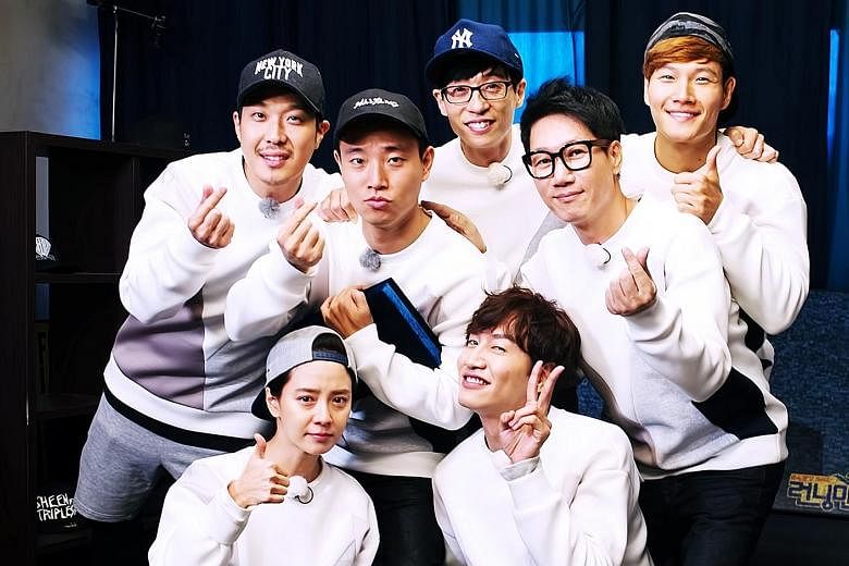 The original cast of South Korean game show Running Man comprised (standing, from left) Haha, Kang Gary, Yoo Jae Suk, Ji Suk Jin, Kim Jong Kook, (seated, from left) Song Ji Hyo and Lee Kwang Soo.