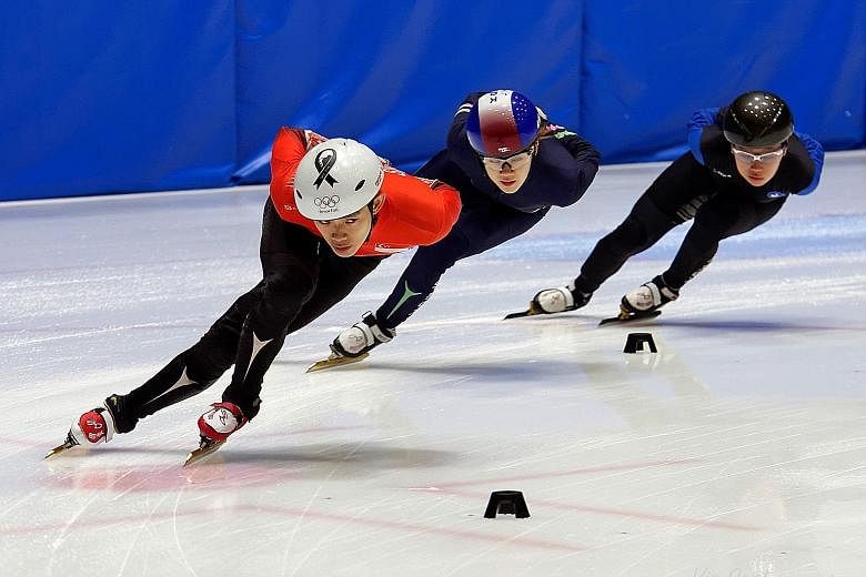Lucas Ng (front) training in Goyang with elite-level Korean skaters, such as 2014 Winter Olympics gold medallist Kong Sang Jeong (back).