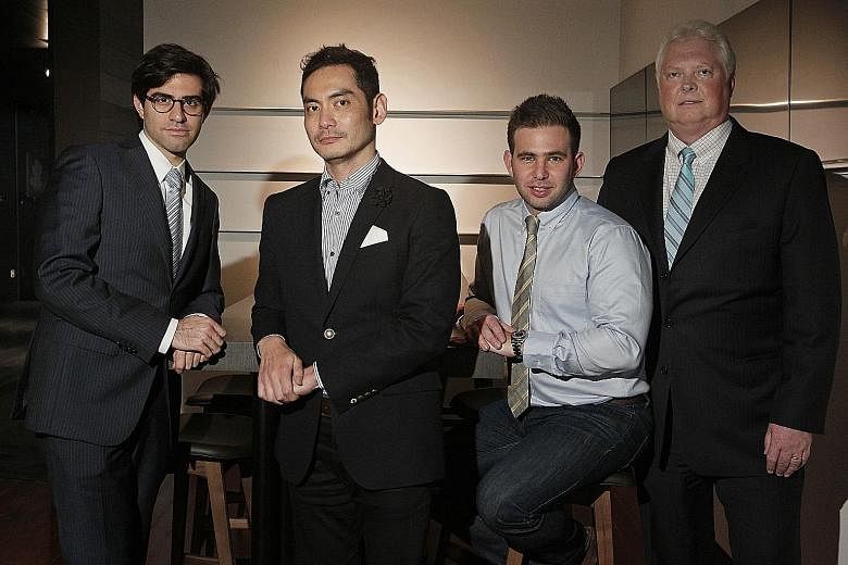 (From left) Platinum Partners deputy chief investment officer David Levy, Asiasons Capital managing director Jared Lim, Jett Capital deal adviser Stephen Silver, and Black Elk Energy chief executive John Hoffman in a photo taken in 2013, when they me