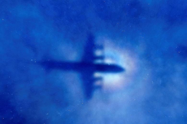 A Royal New Zealand Air Force P3 Orion search aircraft in low-level cloud over the Indian Ocean. Debris from the aircraft was found on the Indian Ocean island of Reunion in 2015.